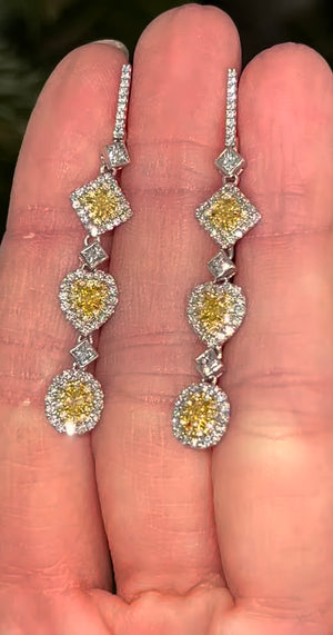 White gold latch back diamond earrings with princess cut, heart and oval yellow diamonds, princess cut white diamonds and round yellow and white diamonds natural
