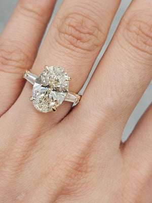 5.0 CT Oval with 0.55 ct baguettes Yellow Engagement Ring