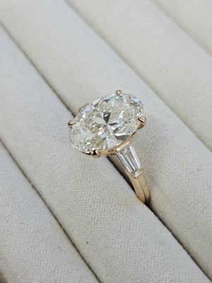 5.0 CT Oval with 0.55 ct baguettes Yellow Engagement Ring