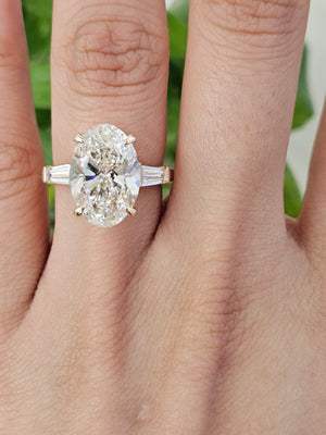 5.0 CT Oval with 0.55 ct baguettes Yellow Engagement Ring