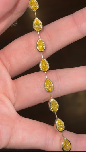 Yellow gold bezel set 10.93ct yellow pear shape lab diamond bracelet