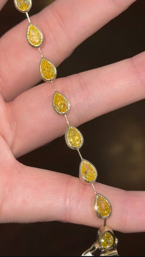 Yellow gold bezel set 10.93ct yellow pear shape lab diamond bracelet
