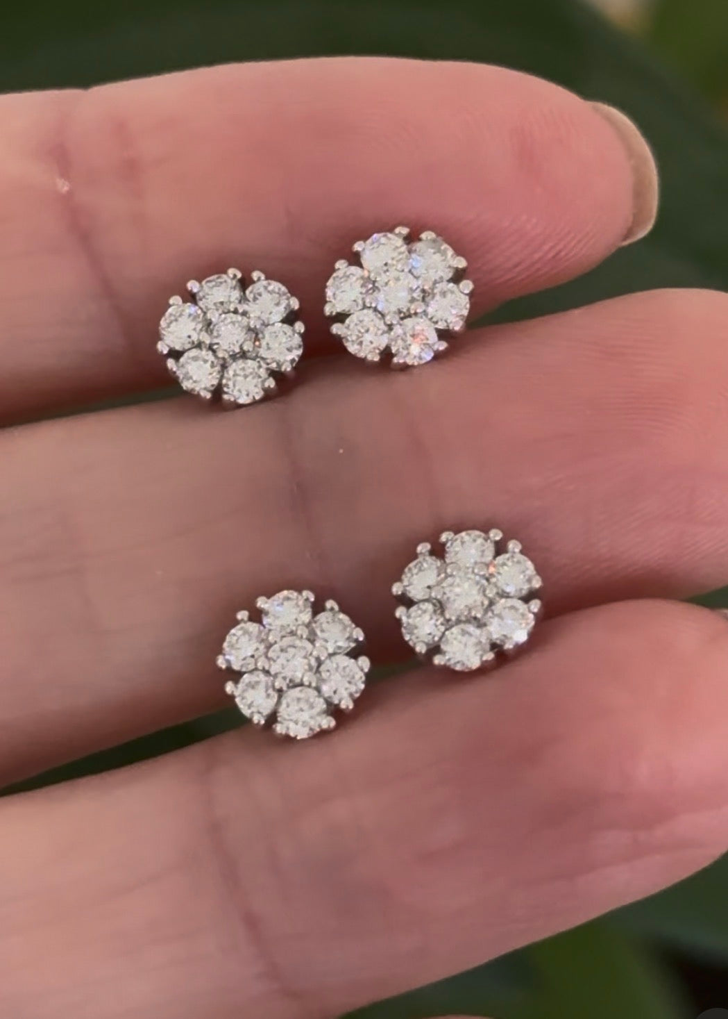 White gold 0.65ct lab diamond flower studs with push backs. Two pairs available.