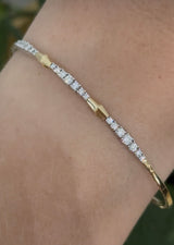 Yellow gold lab diamond flex bracelet. Lab diamonds are set in white gold.