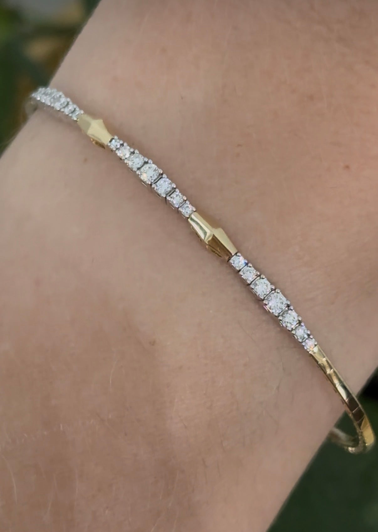Yellow gold lab diamond flex bracelet. Lab diamonds are set in white gold.