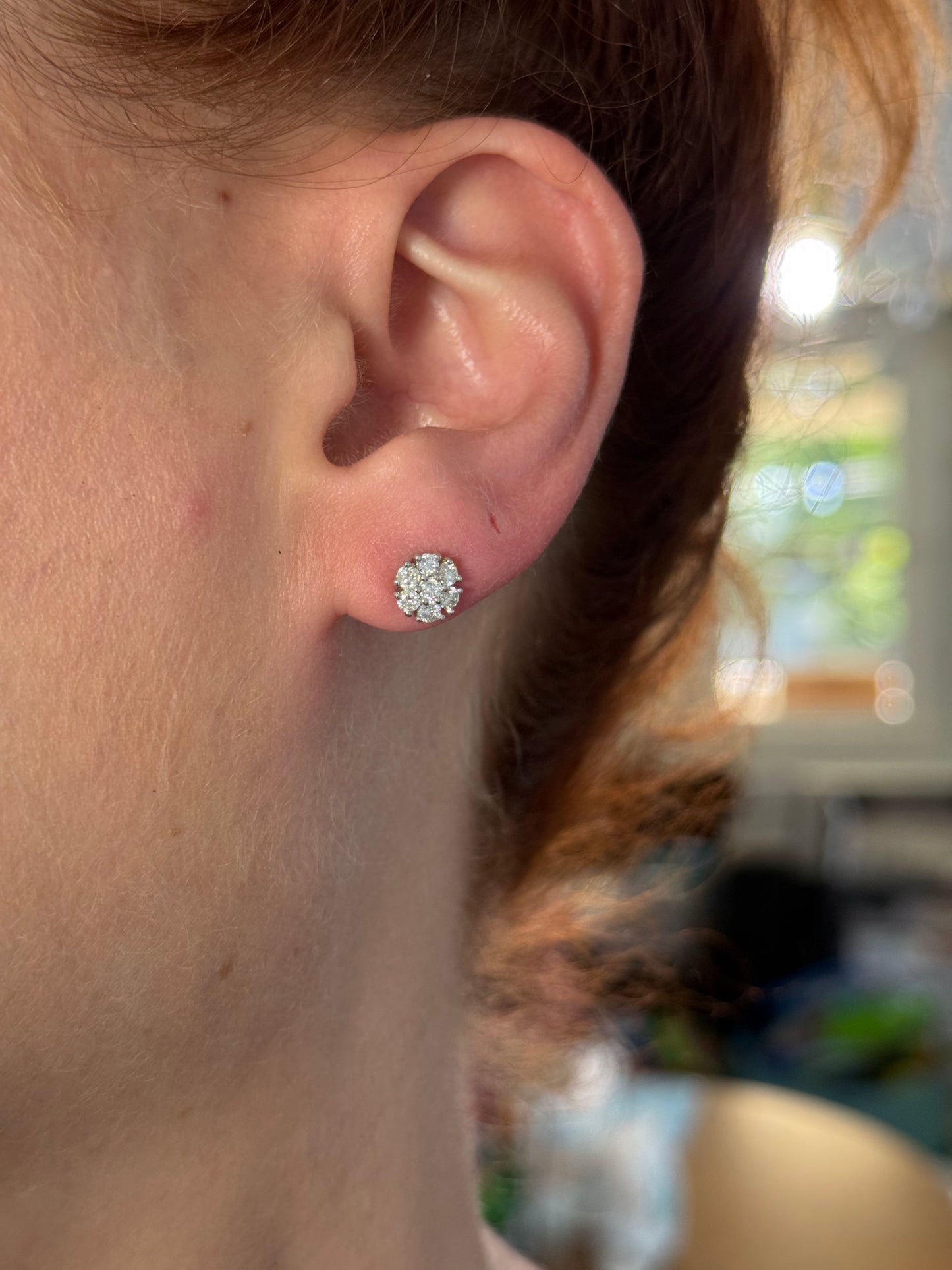 White gold 0.65ct lab diamond flower studs with push backs. Two pairs available.