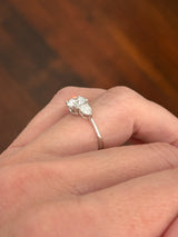 White gold round and pear shape lab diamond ring