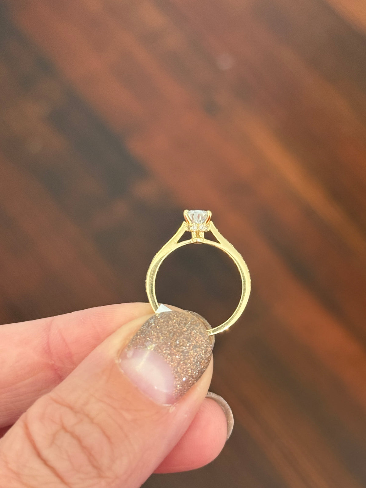 Size 3.75 IGI certified yellow gold pear and round lab diamond ring. Center stone is 0.58cts
