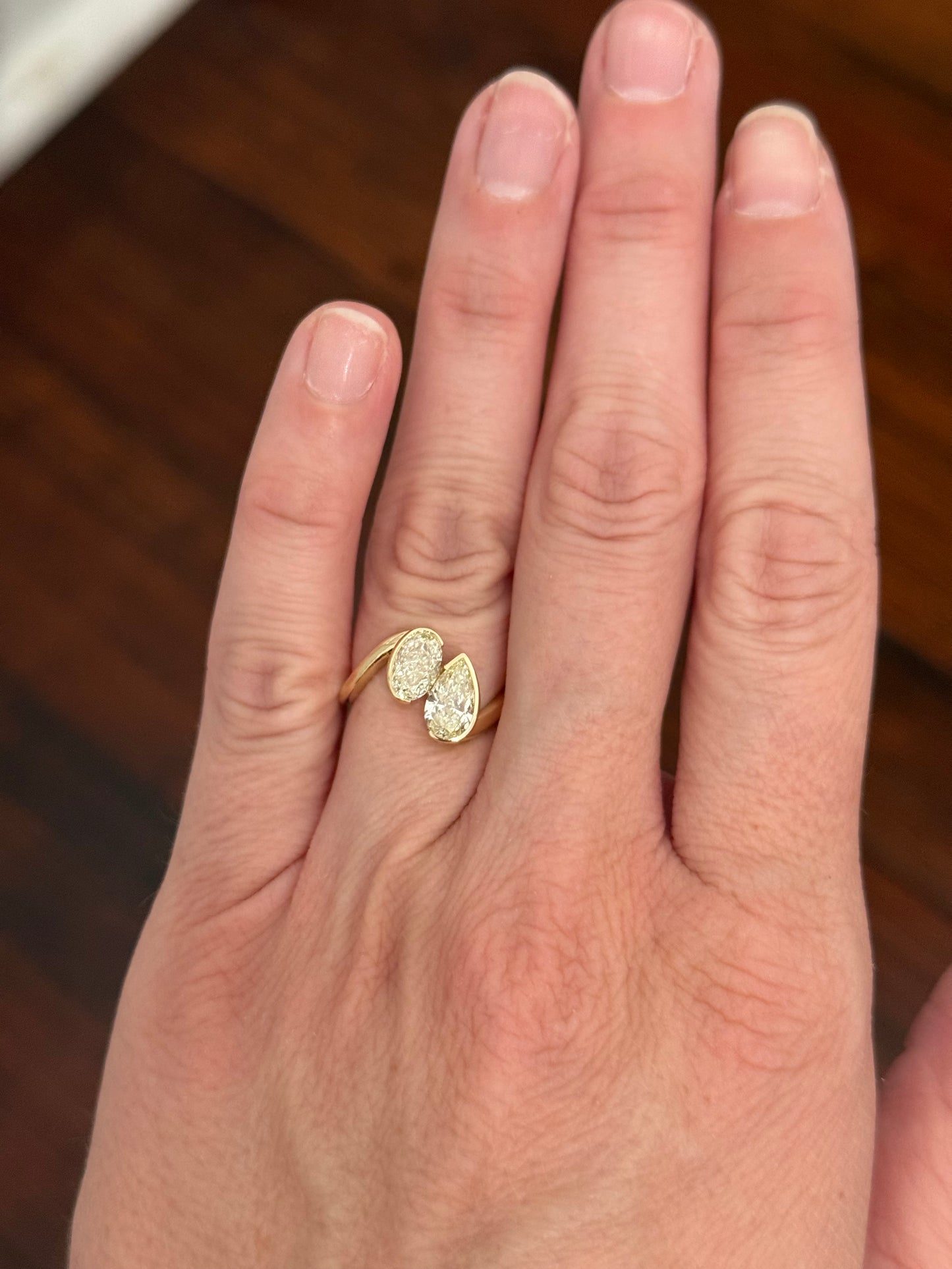 Yellow gold oval and pear shape lab diamond ring