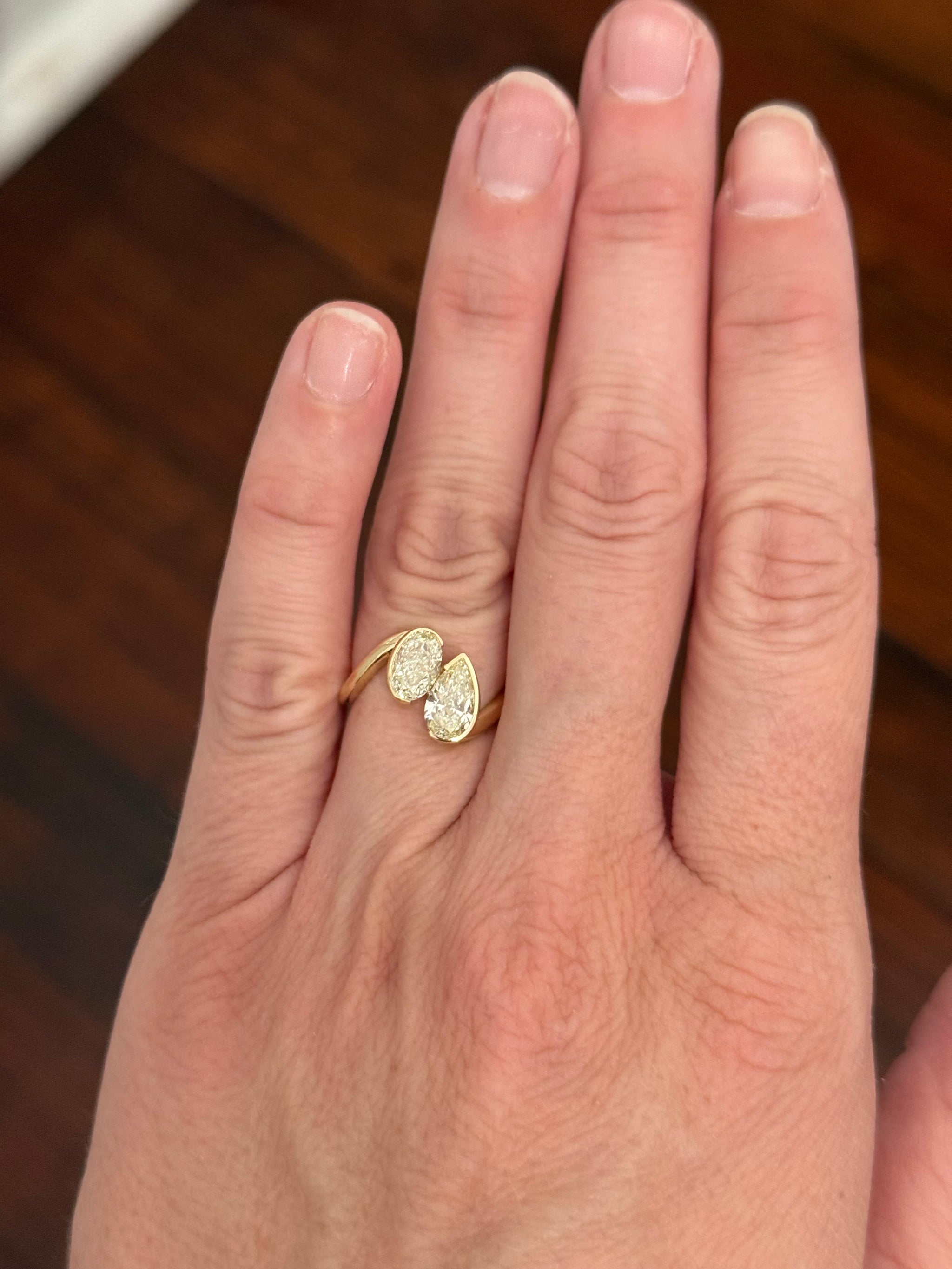 Yellow gold oval and pear shape lab diamond ring
