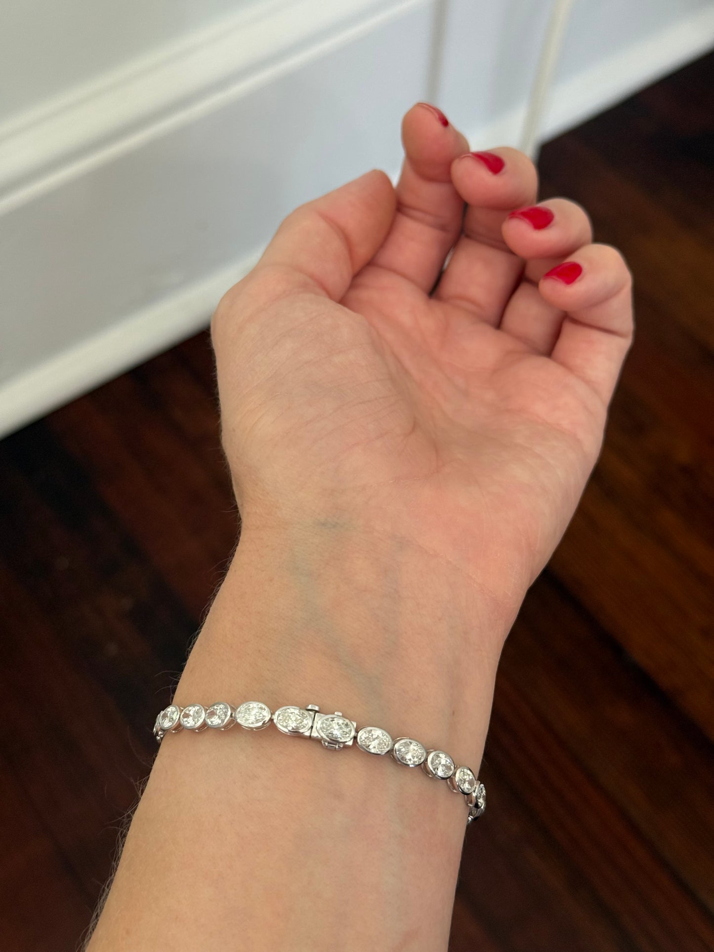 White gold bezel and east west set 10.03ct oval lab diamond bracelet