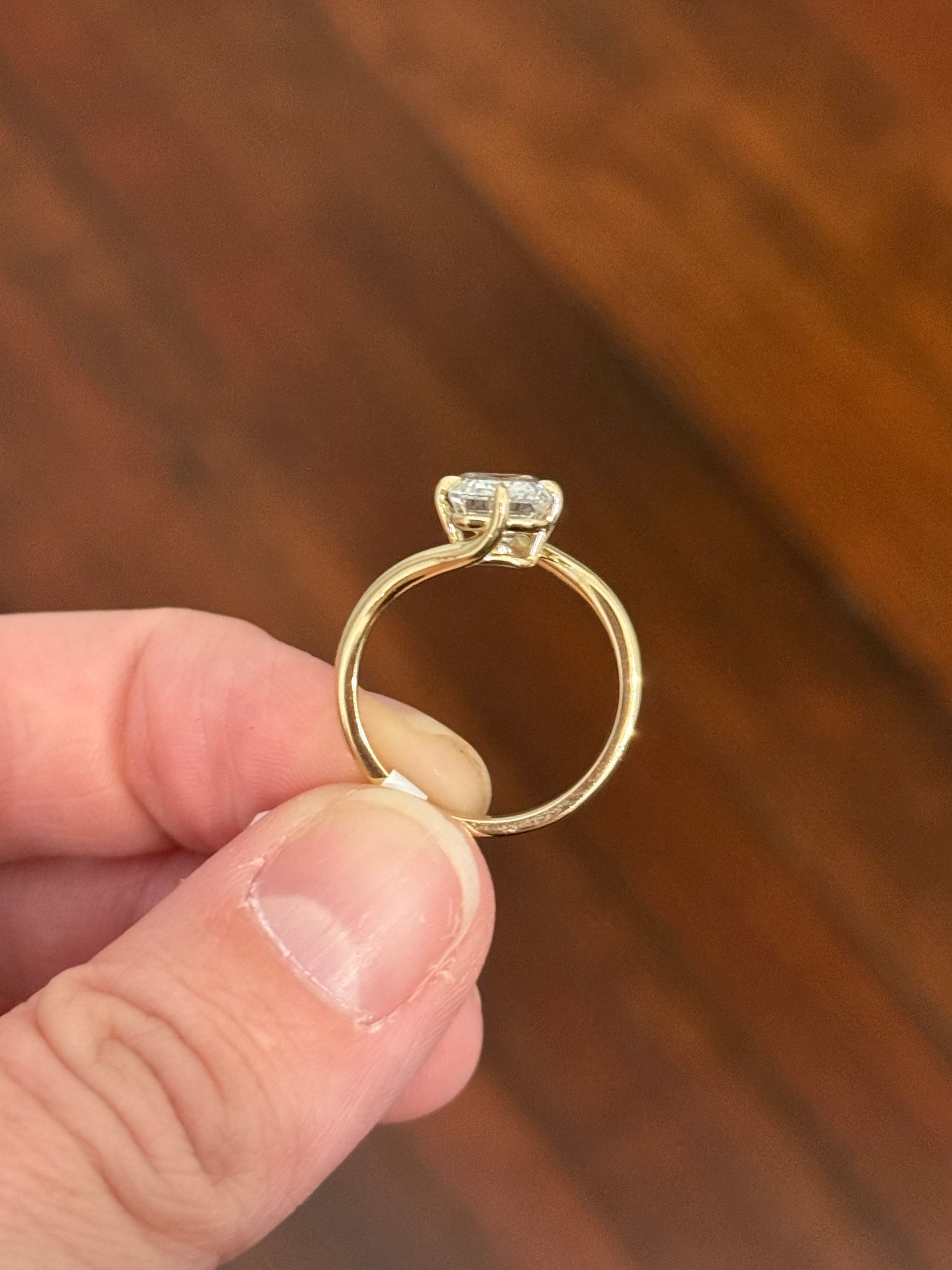 Yellow gold IGI certified 3.03ct emerald cut lab diamond ring