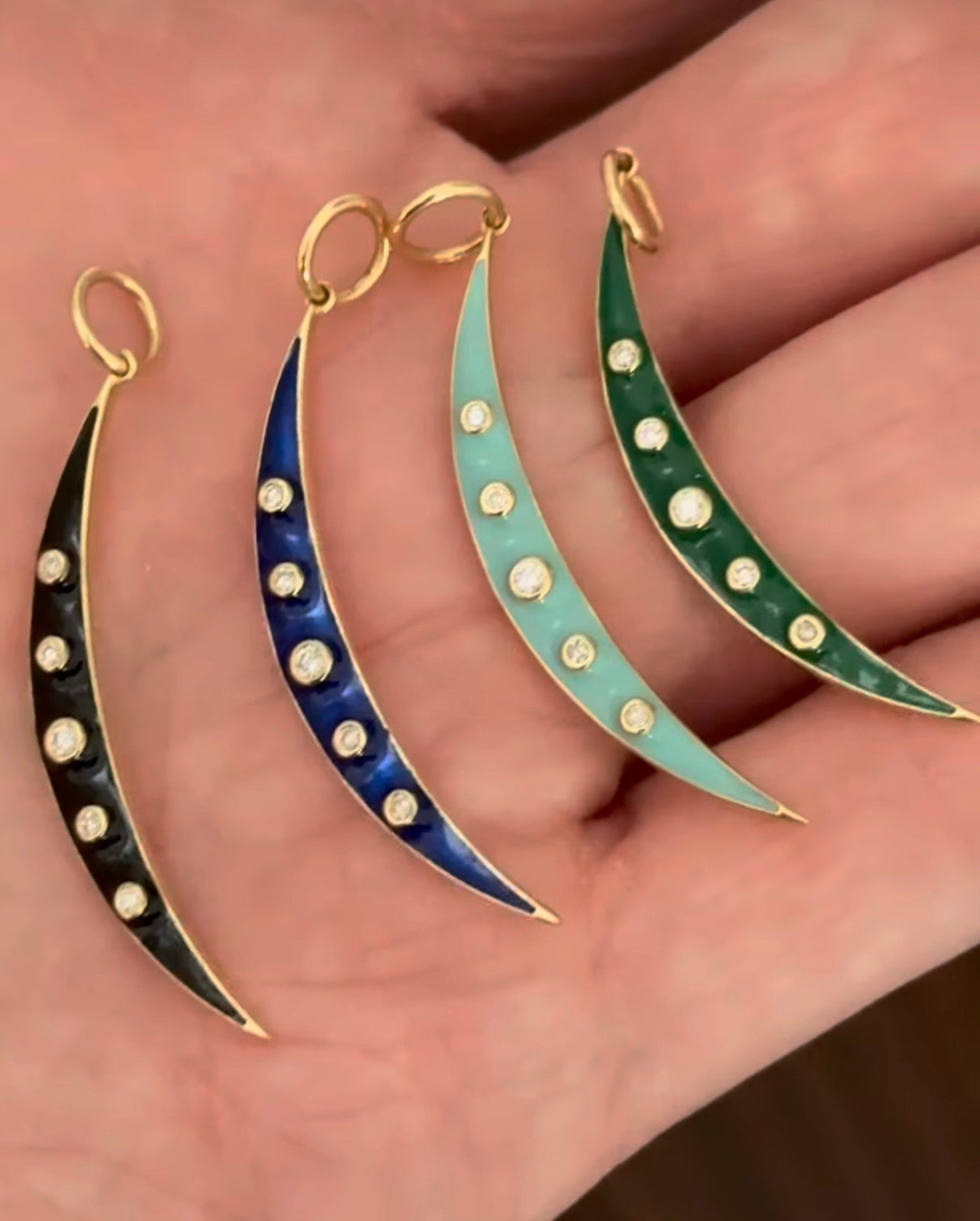 Yellow gold natural diamond and enamel crescent pendants