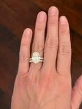 Yellow gold oval and round lab diamond ring and band set. Center stone is 6.58cts