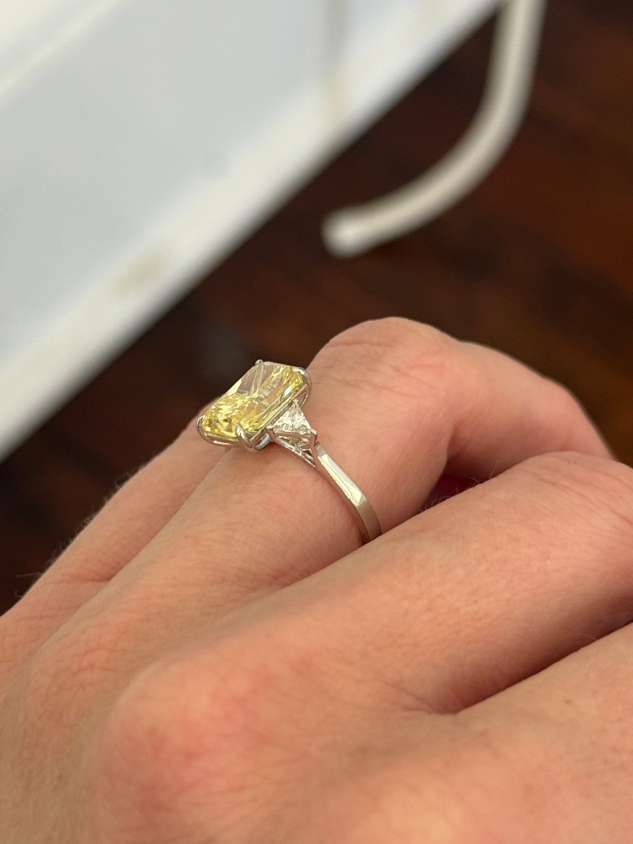 White gold radiant yellow lab diamond and trillion cut white lab diamond ring