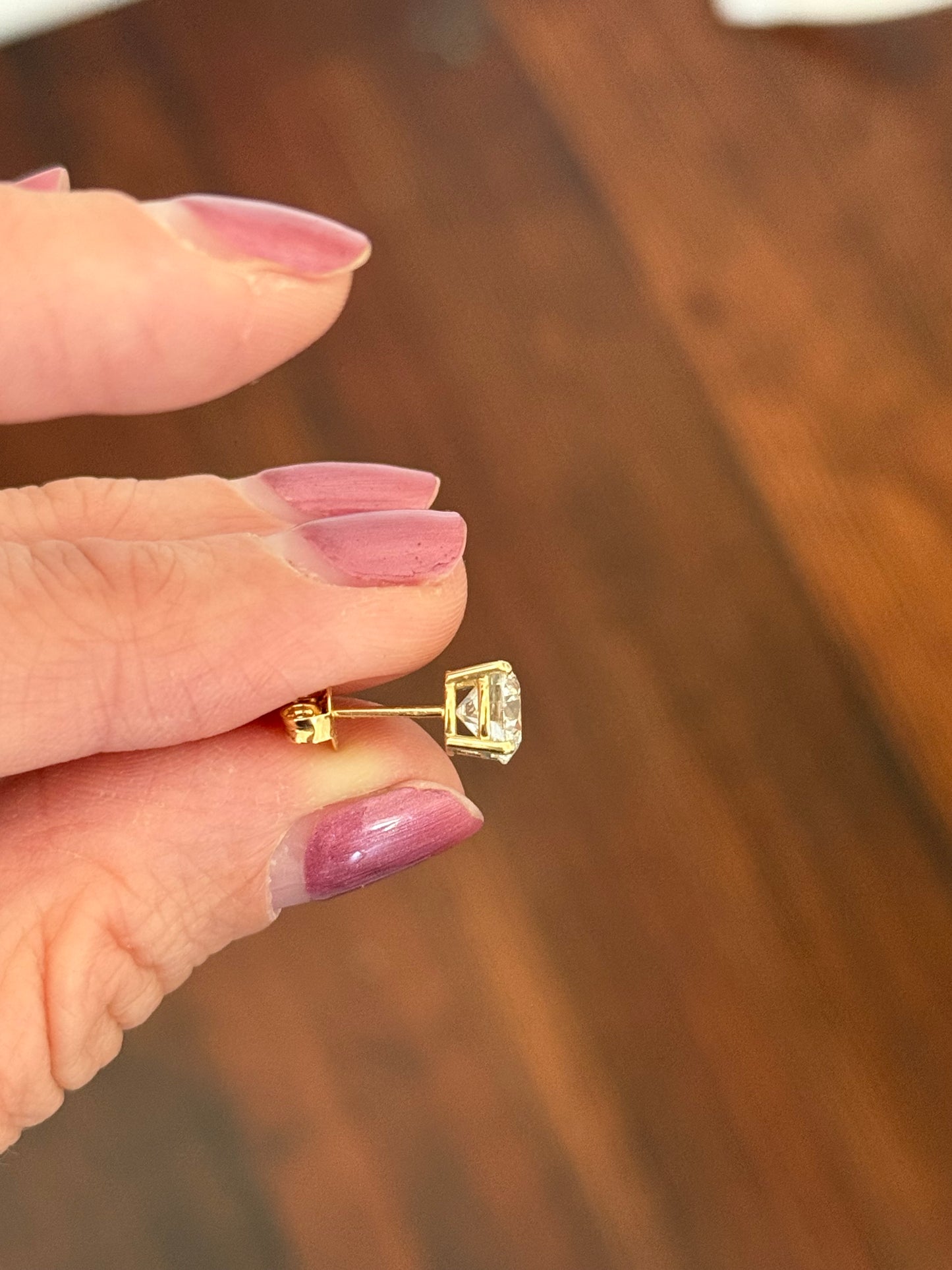 4 prong yellow gold basket setting TW 2.5ct lab diamond stud earrings with pushbacks. Includes IGI Jewelry Report.