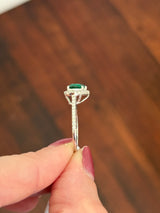 White gold heart shaped lab emerald and round lab diamond ring