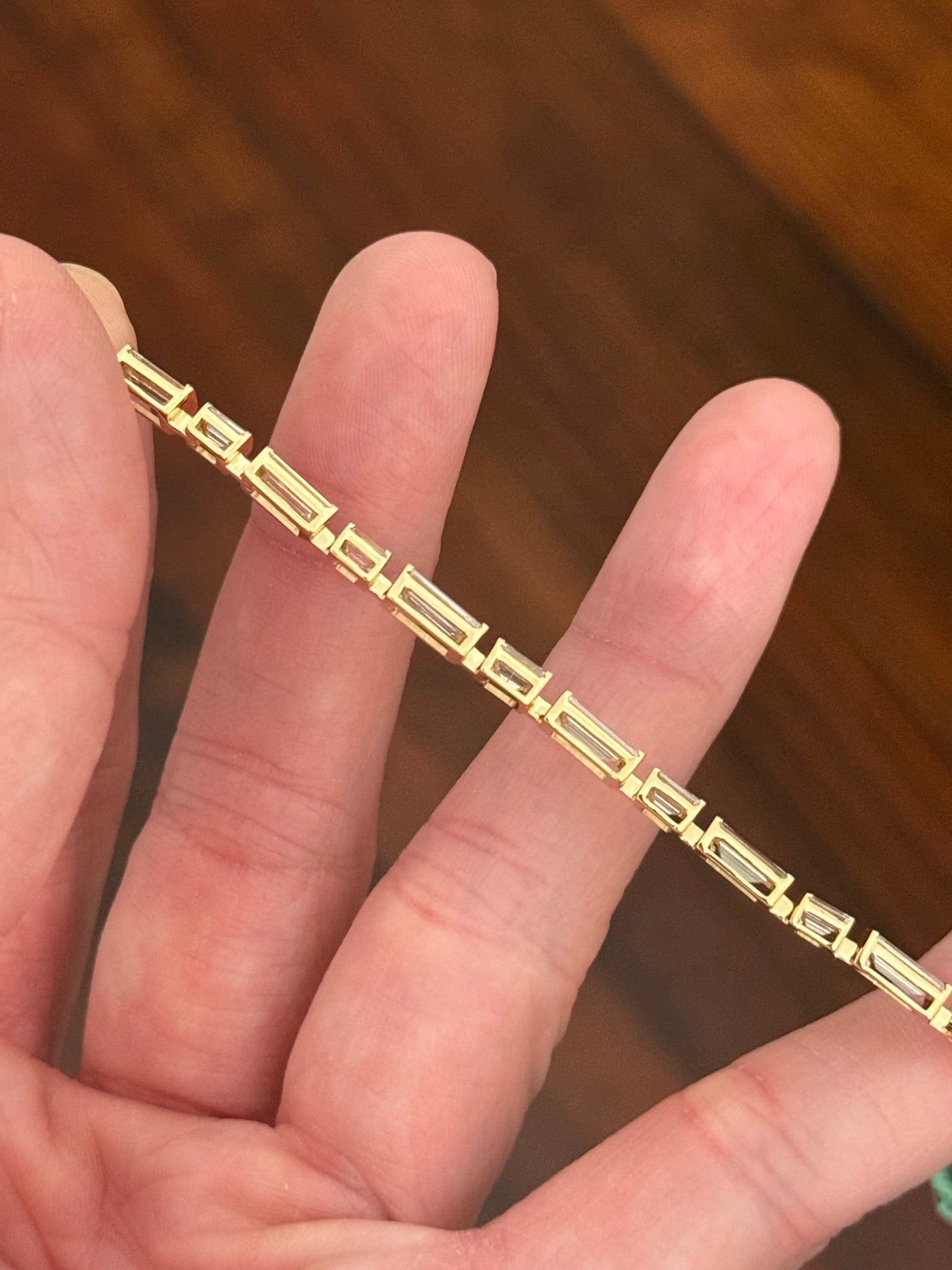 Yellow gold 7.22ct baguette and emerald cut natural diamond bracelet
