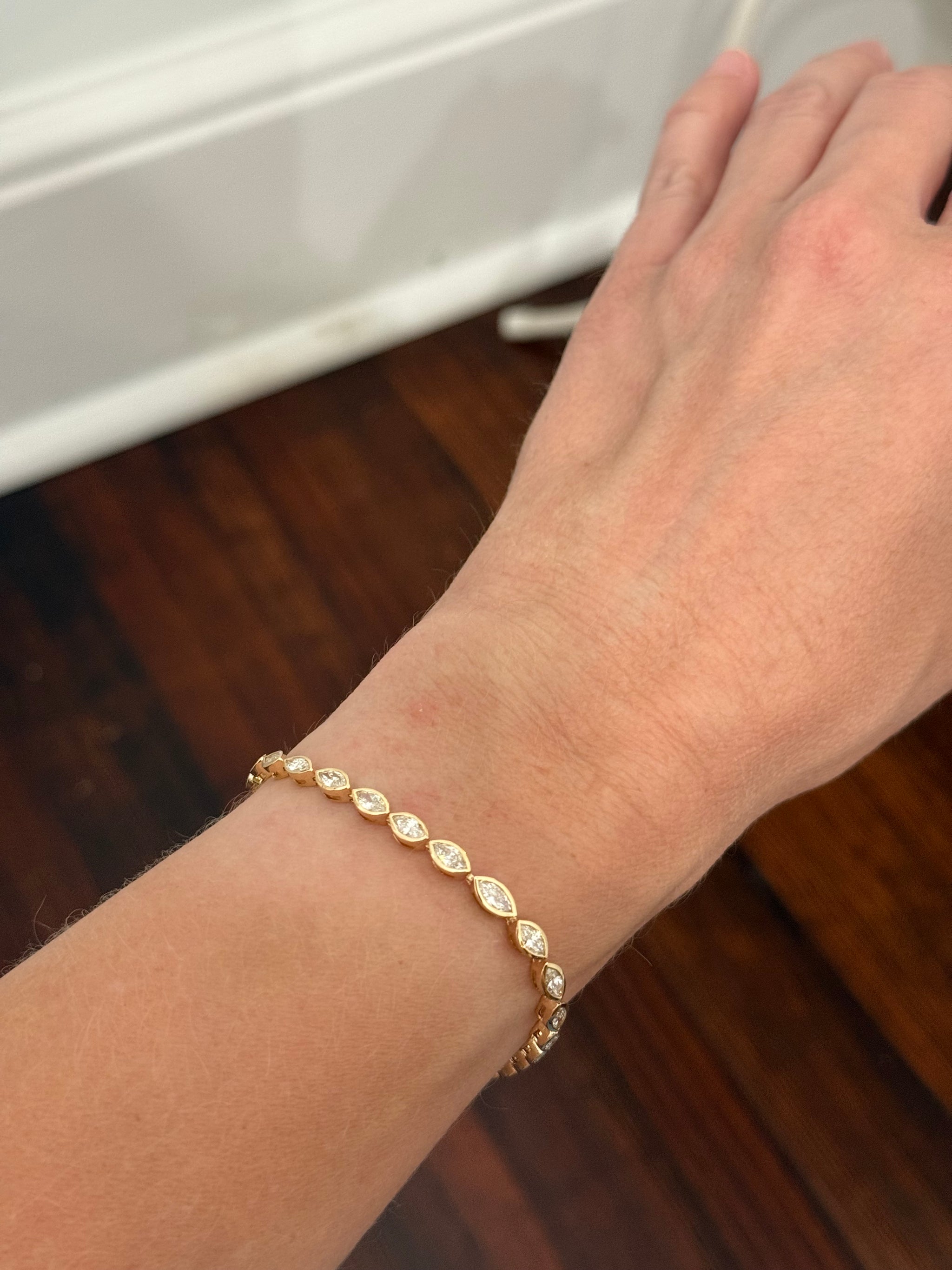 Yellow gold bezel set 4.05ct marquise natural diamond bracelet