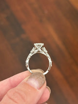 White gold radiant, marquise and round lab diamond ring. Center stone is 3.06cts E VS1 and measures 9.7x6.6mm