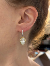 Oval lab diamond latch back earrings. Lab diamonds are set in yellow gold and earrings are white gold.