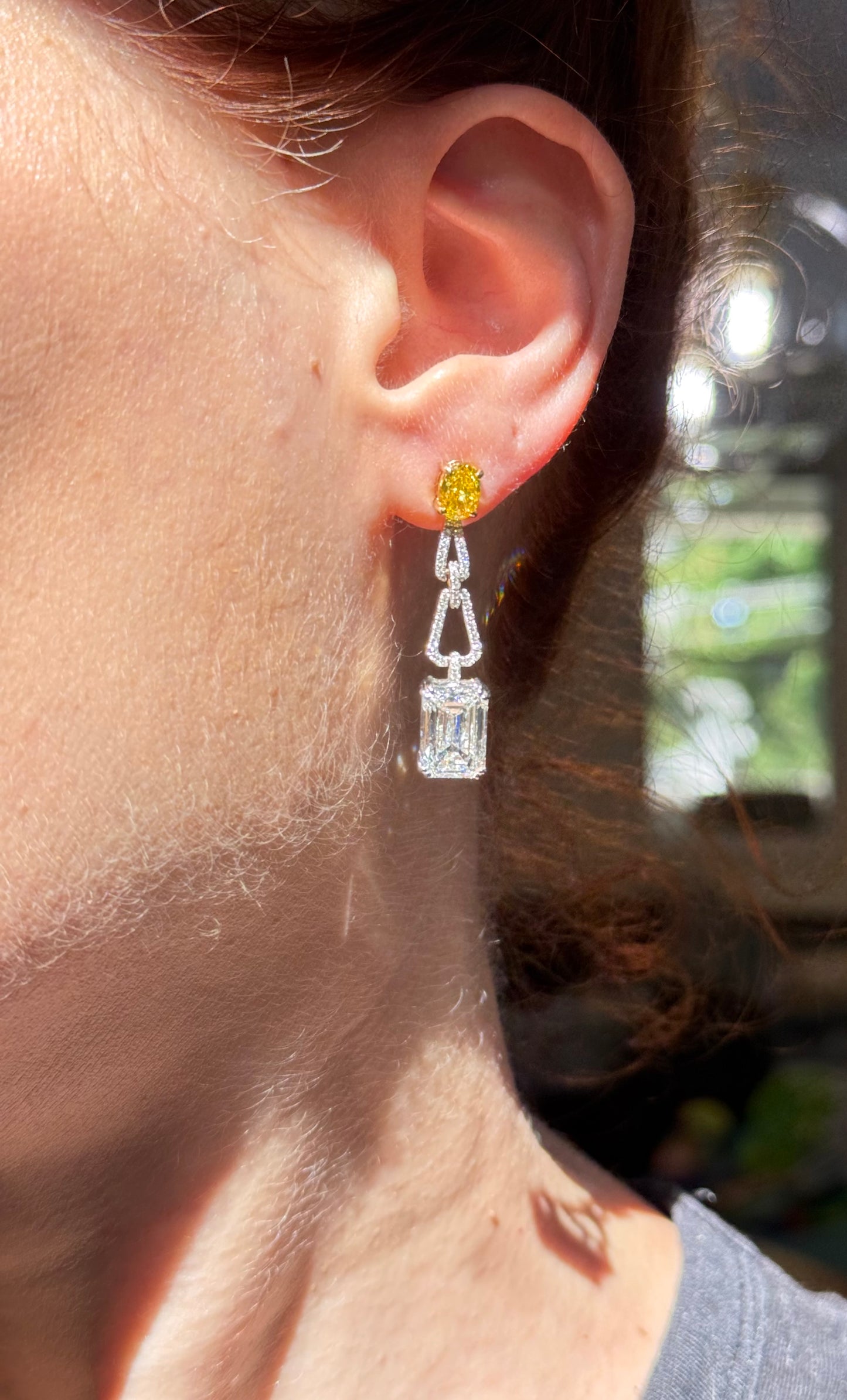 White and yellow gold oval yellow lab diamond and emerald cut and round white lab diamond dangle earrings