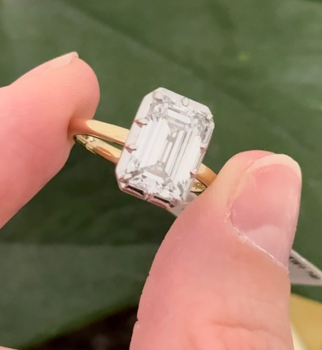 Georgian set IGI certified 4.11ct emerald cut lab diamond ring. Lab diamond is set in white gold and band is yellow gold