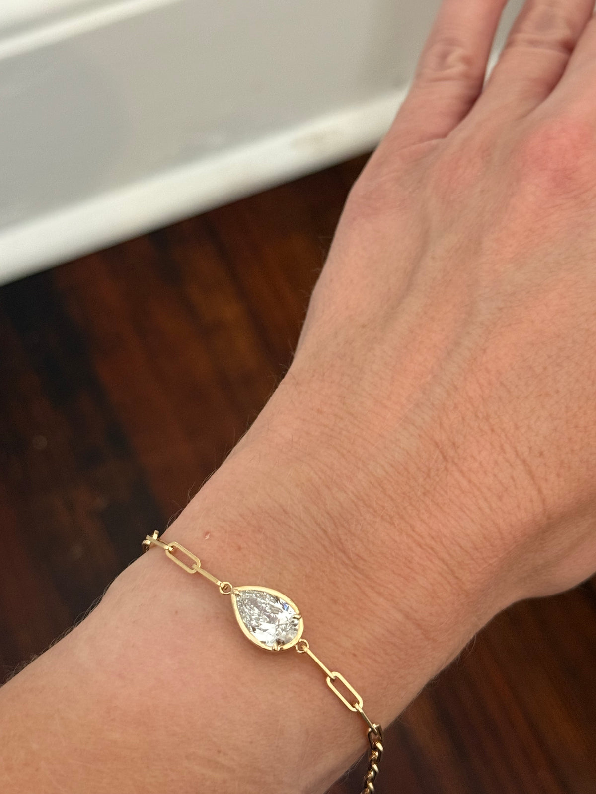 Yellow gold paperclip IGI certified 3.06ct pear shape lab diamond bracelet. Pear measures 13.24x8.22x4.82mm