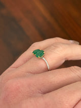 White gold natural emerald and diamond ring. Emeralds prongs are yellow gold.
