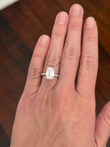 IGI certified emerald cut and round lab diamond ring. Center stone is 5.06cts