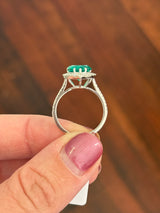 White gold heart shape lab emerald and round lab diamond ring