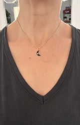 Yellow gold natural diamond and black enamel crescent pendant