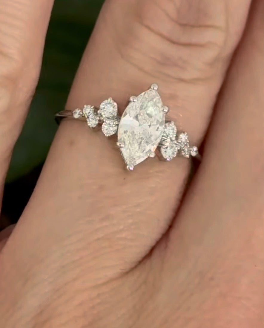 White gold marquise and round lab diamond ring