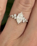 White gold marquise and round lab diamond ring