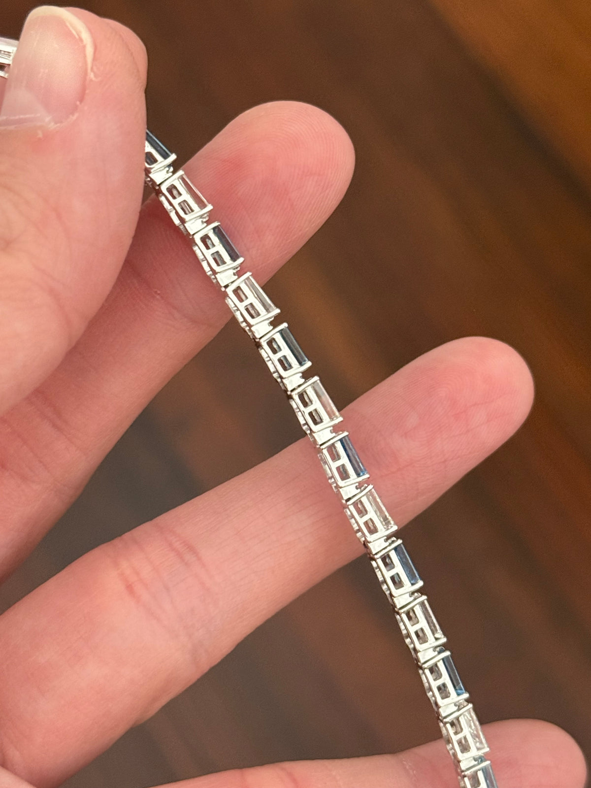 White gold 5.91ct tapered baguette blue and white lab diamond bracelet