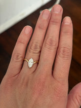 Yellow gold 1.49ct marquise lab diamond ring. Prongs are white gold.