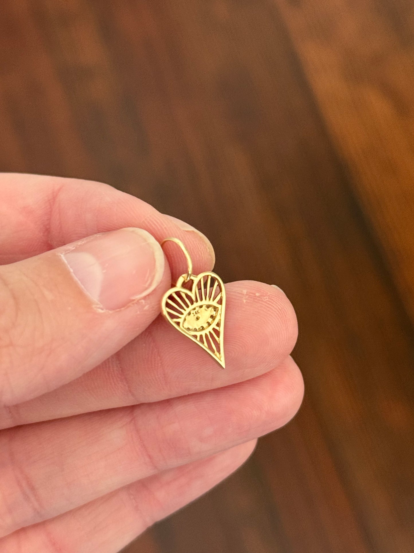 Yellow gold natural diamond and sapphire evil eye heart pendant