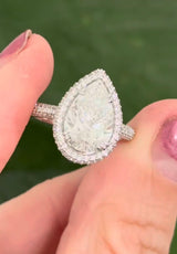 White gold pear shape and round lab diamond ring