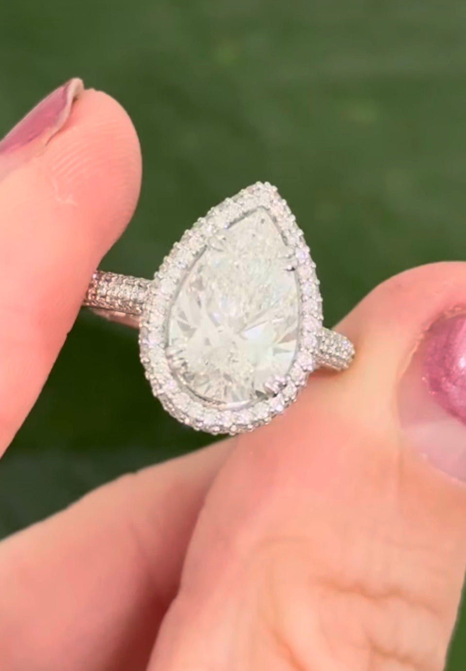 White gold pear shape and round lab diamond ring