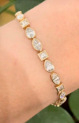 Yellow gold bezel set 8.49ct marquise, pear shape and princess cut natural diamond bracelet