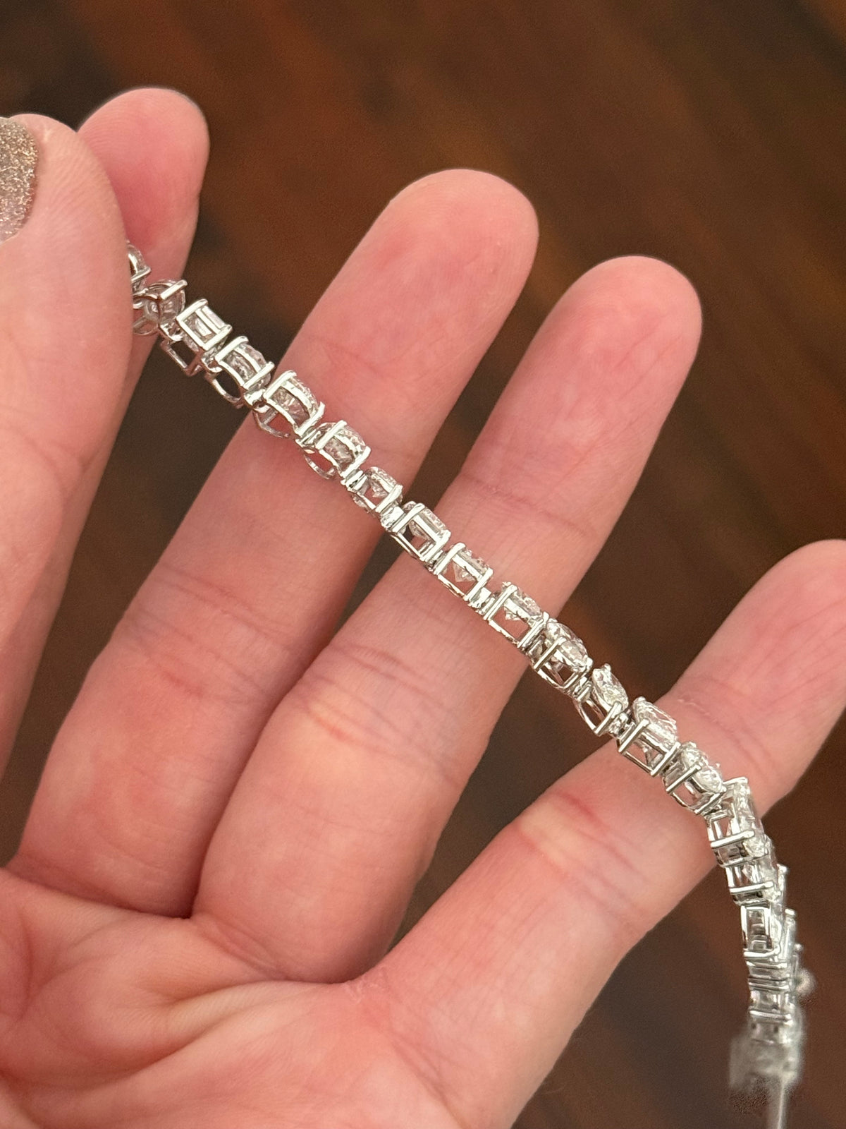 White gold mixed shape bracelet with 15.57cts of pear shape, oval, marquise, emerald cut and round lab diamonds
