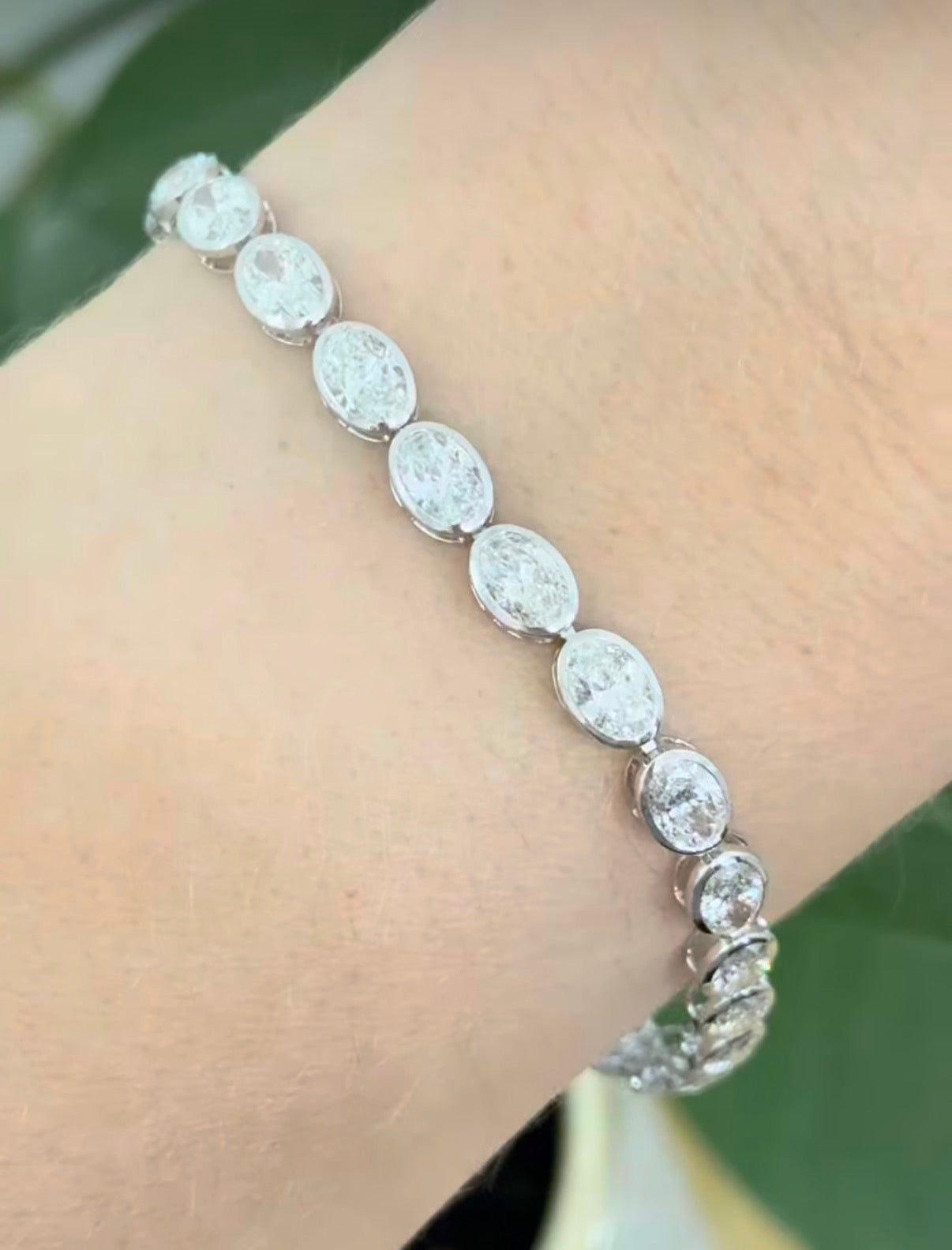 White gold bezel and east west set 10.03ct oval lab diamond bracelet