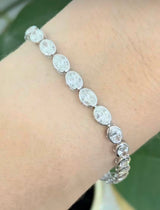 White gold bezel and east west set 10.03ct oval lab diamond bracelet