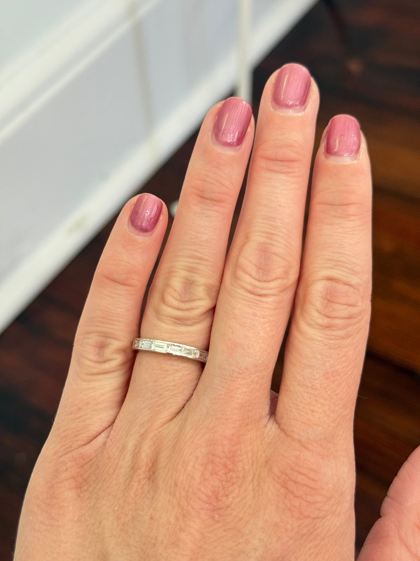 White gold east west set emerald cut lab diamond band
