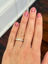 White gold east west set emerald cut lab diamond band
