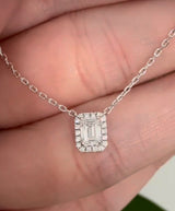 White gold emerald cut lab diamond necklace. Center stone is 0.50cts and measures 5.2x3.7mm. Chain is 16” with an adjustment of 4” to make as long as 20”.