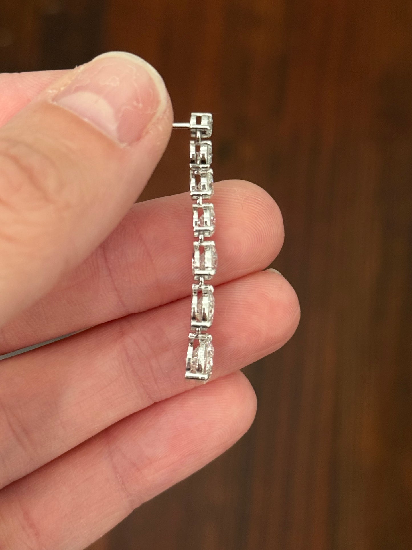 White gold 6.09ct graduated lab diamond earrings