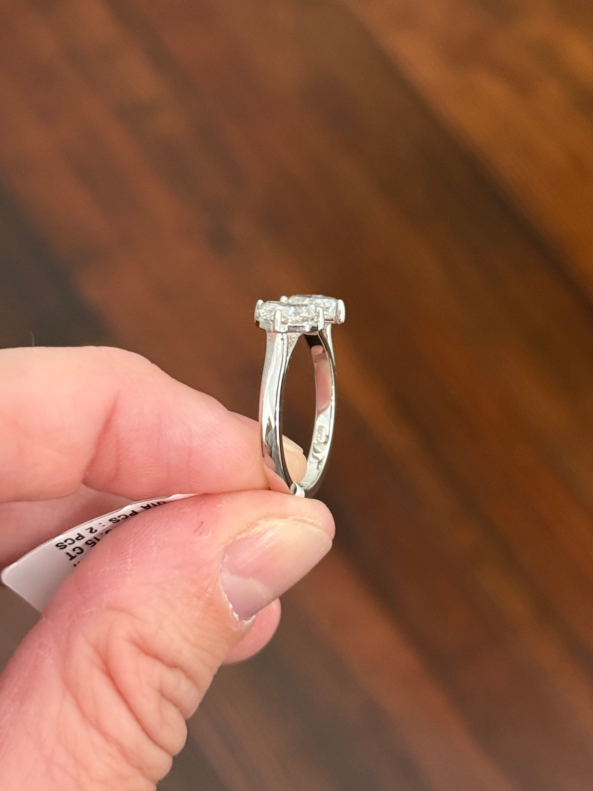 White gold 3.15ct step cut pear shape lab diamond bypass ring. Each measures 10.45x5.70mm