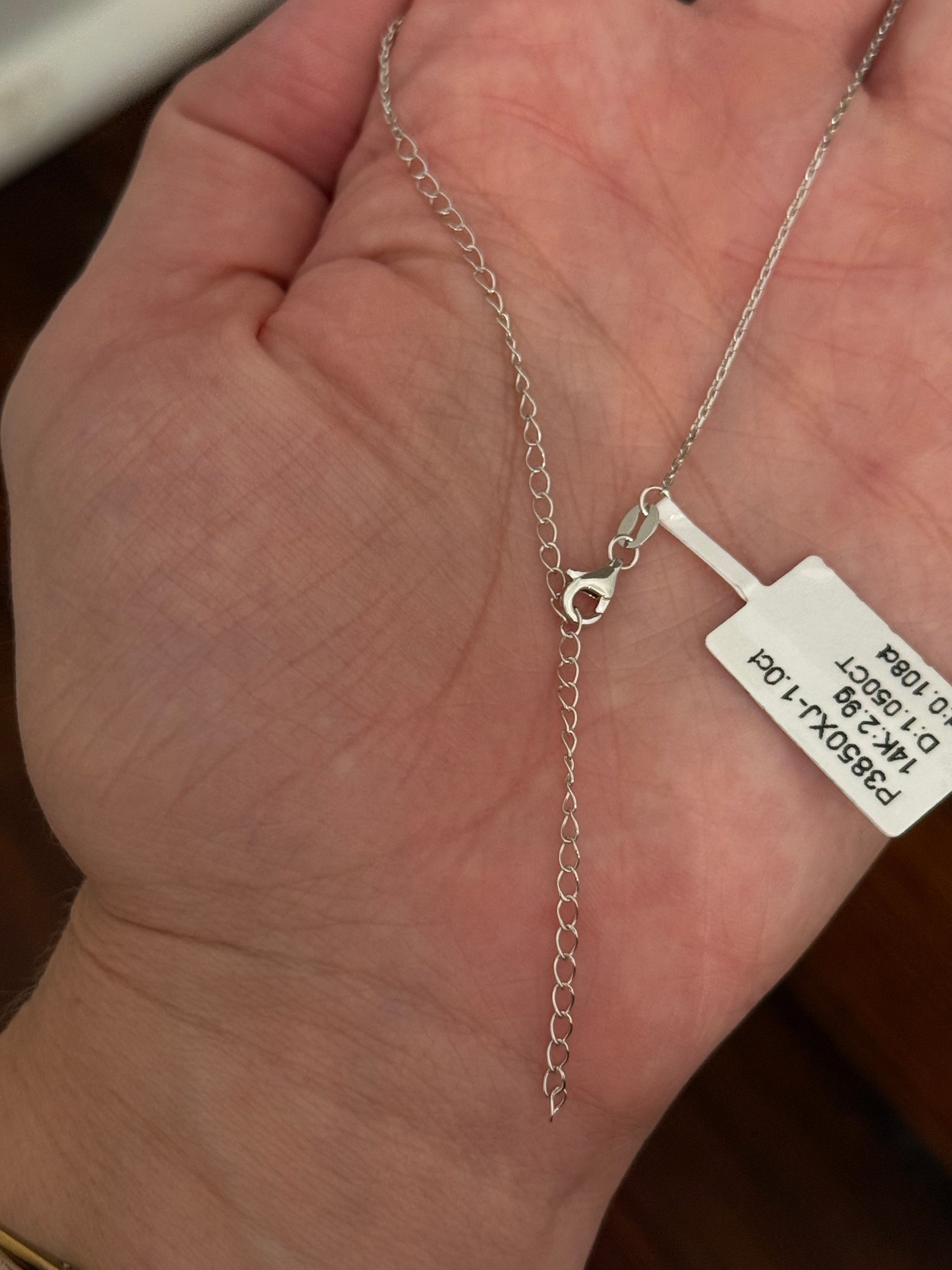 White gold heart shaped lab diamond necklace. Center stone is 1.05cts and measures 6x6.9mm. Chain is 16” with an adjustment of 4” to make as long as 20”.