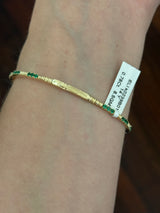 Yellow gold emerald flex bracelet